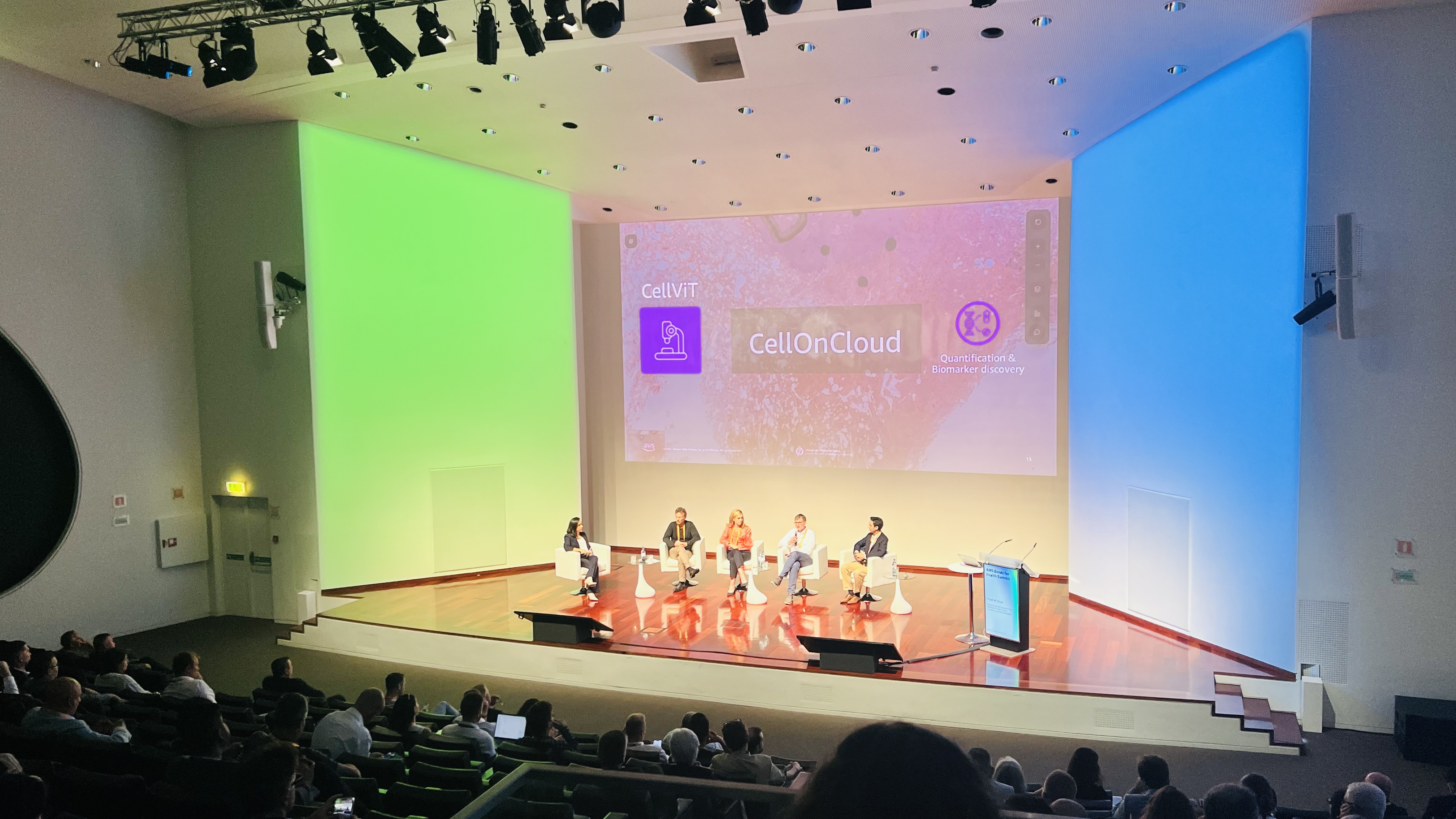Panel discussion on stage at the AWS GenAI for Health Summit